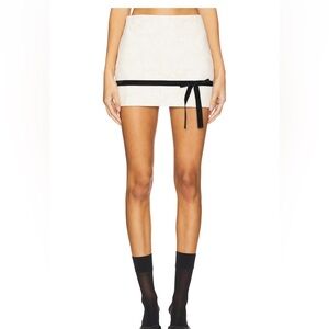 Lace mini skirt with black bow